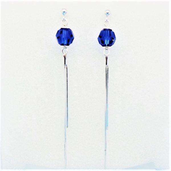 Sleek Swarovski Blue Pom Pom Earrings with Tassel